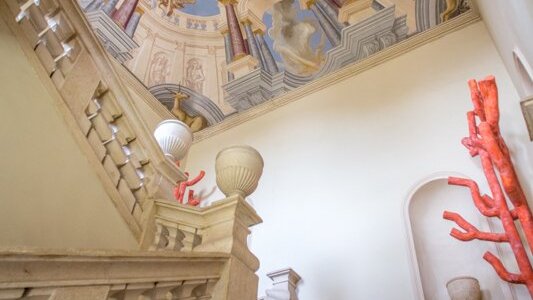 Scalone d'onore affrescato dal Falcieri con rappresentazione della caduta di Fetonte