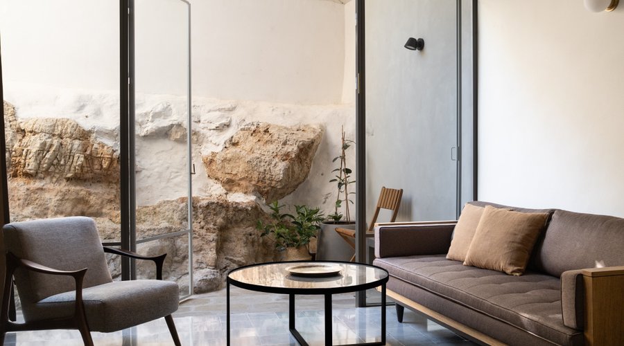 The Rock suite's interior and exit to the suite's private outdoor Patio