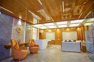 Best Western Vrindavan in Vrindavan, image may contain: Interior Design, Indoors, Wood, Foyer