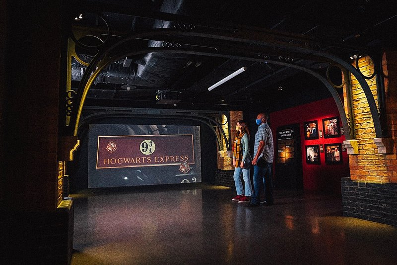 A couple checking out The Harry Potter Photographic Exhibition at the London Film Museum