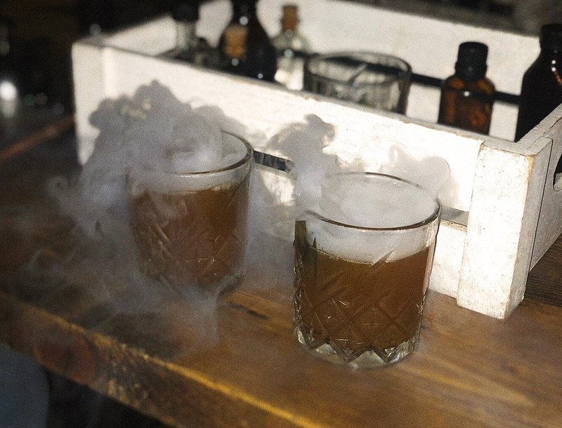 Two smoking cocktails at The Cauldron Bar in London