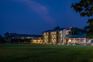 Paramount Riverfront Resort & Spa, Karjat in Karjat, image may contain: Villa, Hotel, Neighborhood, Grass