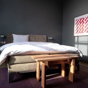 All 13 hotel rooms look completely different, as each is dedicated to a different artist, but all have the same feeling of comfort. Each room reaches the highest standard in interior design with a mix of original Piet Hein Eek designs, antiques, art and the luxurious beds. 