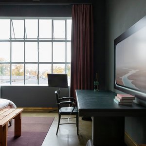 All 13 hotel rooms look completely different, as each is dedicated to a different artist, but all have the same feeling of comfort. Each room reaches the highest standard in interior design with a mix of original Piet Hein Eek designs, antiques, art and the luxurious beds. 