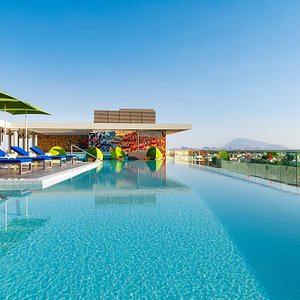Rooftop Splash Pool during the day with views of Al Ain 