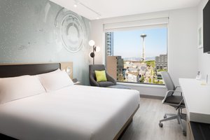 Astra Hotel, Seattle, a Tribute Portfolio Hotel by Marriott in Seattle, image may contain: Chair, Furniture, Penthouse, Bed