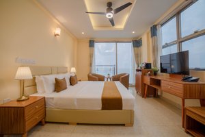 Amber Beach in Hulhumale, image may contain: Monitor, Screen, Computer Hardware, Ceiling Fan