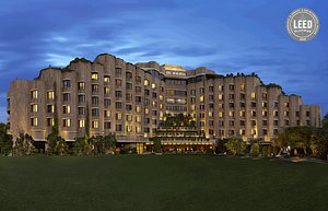 ITC Maurya in New Delhi, image may contain: Hotel, City, Grass, Resort