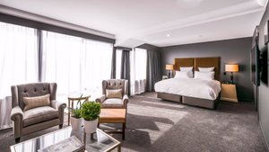 Hotel Montreal in Christchurch, image may contain: Home Decor, Furniture, Plant, Bedroom