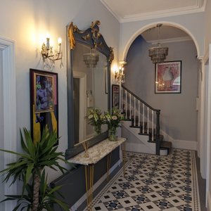 Hallway leading to the ground floor rooms and staircase up to the 3 first floor rooms.