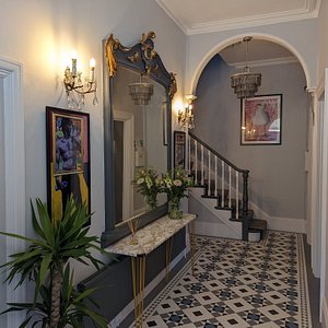 Hallway leading to the ground floor rooms and staircase up to the 3 first floor rooms.