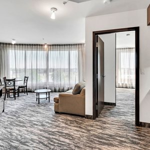 Hôtel Mortagne in Boucherville, image may contain: Interior Design, Indoors, Furniture, Bed