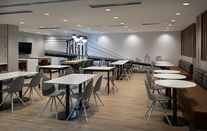 TownePlace Suites by Marriott New York Brooklyn in Brooklyn, image may contain: Restaurant, Cafeteria, Indoors, Chair