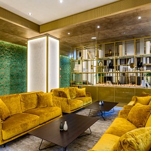 Emerald Hotel & Suites in Budapest, image may contain: Couch, Living Room, Home Decor, Interior Design
