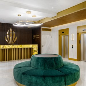 Emerald Hotel & Suites in Budapest, image may contain: Couch, Living Room, Home Decor, Interior Design