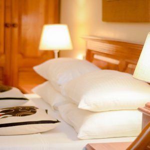 The Sheets, Pillows, and Accessories That Will Make Your Bedroom Feel Like Your Favorite Hotel