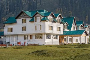 Country Inn & Suites by Radisson , Sonamarg in Sonamarg, image may contain: Resort, Hotel, Building, Housing