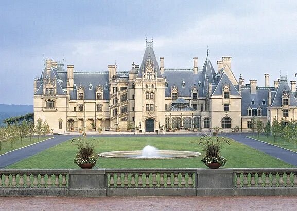 Exterior of Biltmore mansion and large front lawn