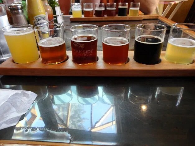 Flight of beer on a paddle