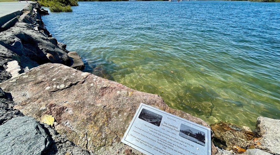 At one time, there used to be an old swimming pool built into the riverbank. It’s long-gone now except for the stairs which led down to the pool. A plaque marks the spot and gives a little historical background. 