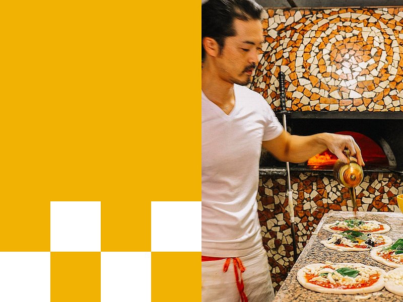 Chef prepping Pizzas
