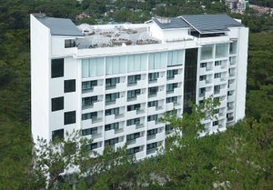 The Plaza Lodge Baguio in Luzon, image may contain: Hotel, City, Condo, Urban