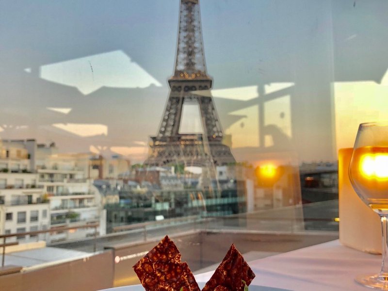View of Eiffel Tower from Les Ombres restaurant in Paris.