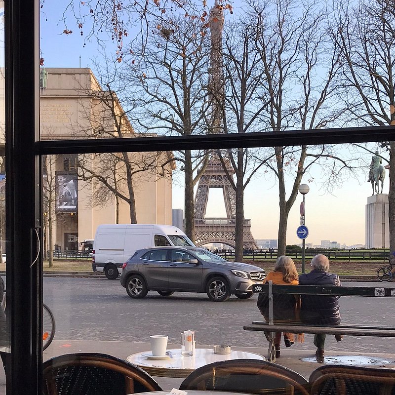 View of Eiffel Tower and an elderly couple from Cafe du Trocadero in Paris