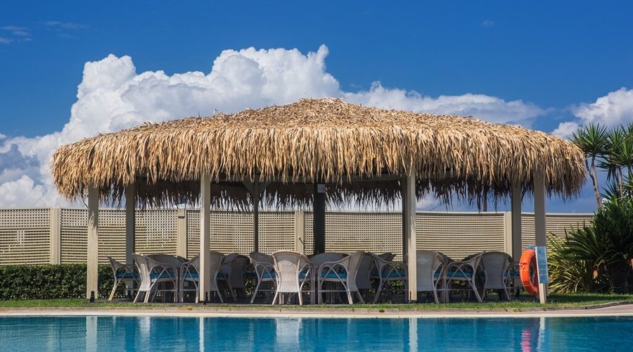Enjoy your cocktail or snack at our kiosk by the pool..