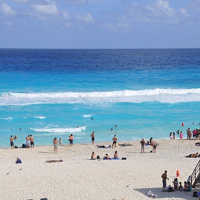 People on the Playa Delfines beach in Cancun
