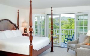 The Shire Woodstock in Woodstock, image may contain: Door, Furniture, Bedroom, Bed