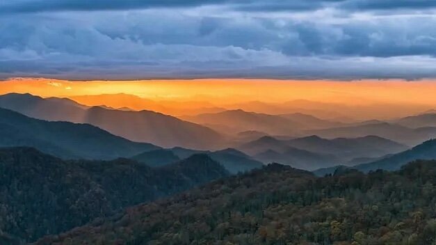 Sunset over cascading Blue Ridge Mountains
