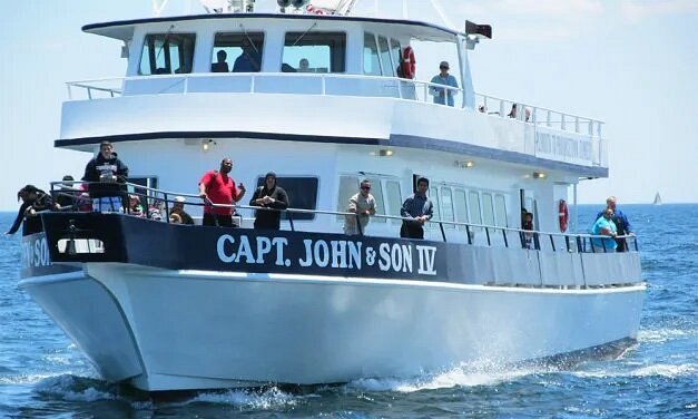 People on Captain John Boats in the water