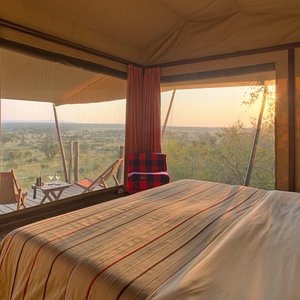 Tent interior with views over Mara Naboisho plains
