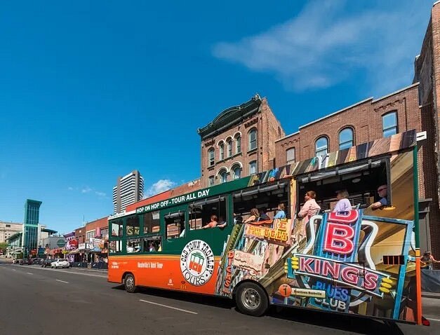 Tour bus driving on Nashville street