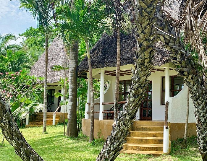Travellers Lodge Bagamoyo ~ Beachview cottages secluded in peaceful gardens, all en-suite with air-conditioner and spacious verandah