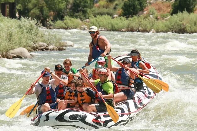 People paddling with Wild West Rafting