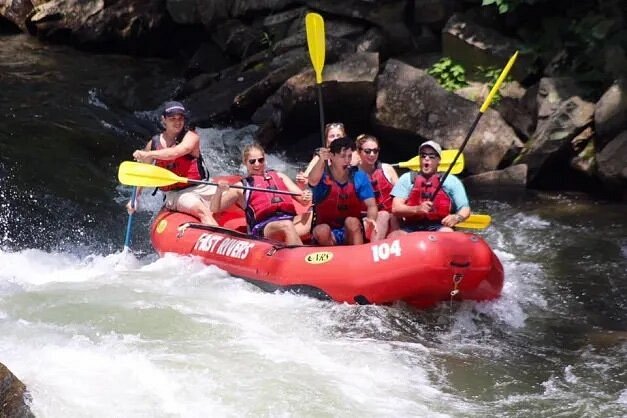 People going over rapids with Nantahala Rafting with Adventurous Fast Rivers