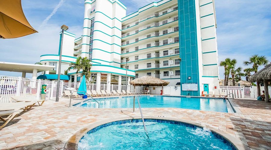 The outside swimming pool and jacuzzi tub at The Resort on Cocoa Beach, FL.
