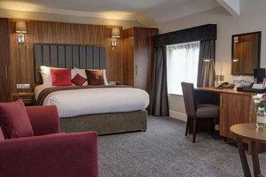 The Croft Hotel in Croft-on-Tees, image may contain: Interior Design, Chair, Home Decor, Bed
