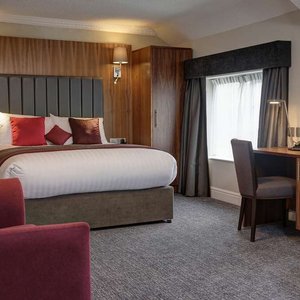 The Croft Hotel in Croft-on-Tees, image may contain: Interior Design, Chair, Home Decor, Bed