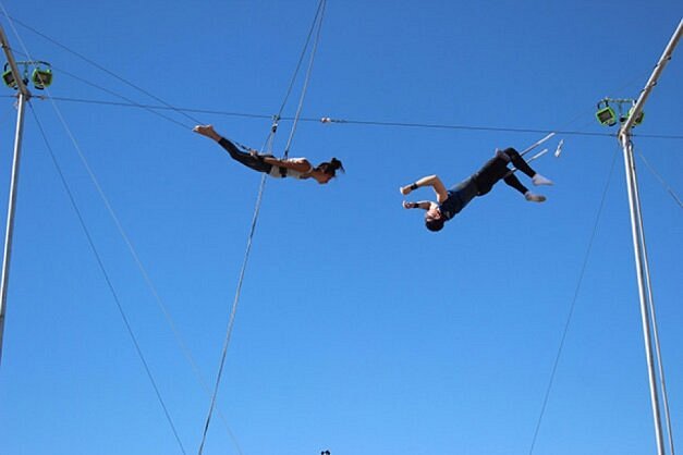 Two people on trapeze