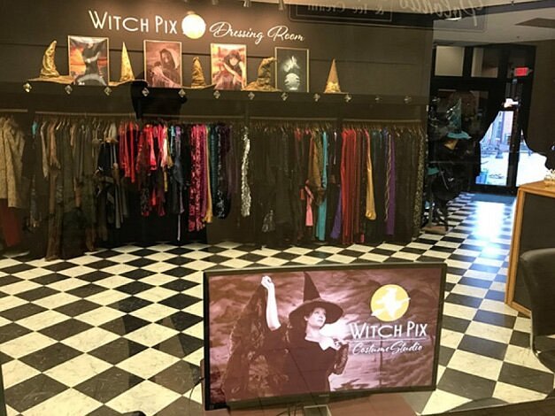 Rack of dress up clothes at Witch Pix