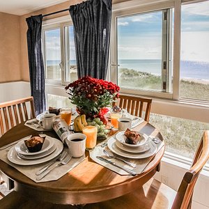 Dining table overlooking the beach at Edgewater Beach Resort in Dennisport, MA. 