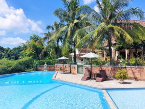 Hotel Deli River in Medan, image may contain: Hotel, Resort, Villa, Chair