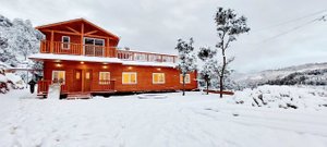Vanprastha Resorts in Dwarahat, image may contain: Housing, House, Hotel, Log Cabin