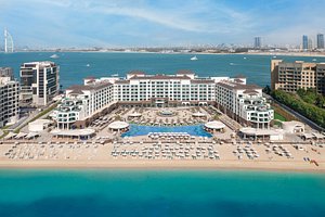 Taj Exotica Resort & Spa, The Palm, Dubai in Dubai, image may contain: Waterfront, Hotel, Resort, City