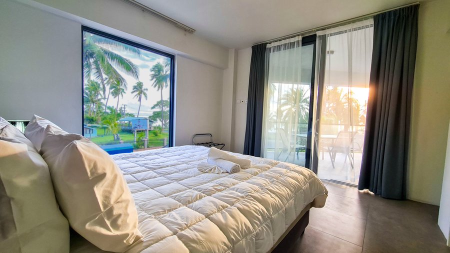 our deluxe bedroom with a frontal view of the sea  