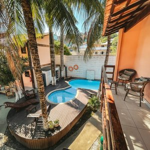Varanda suíte romântica com vista  para piscina 