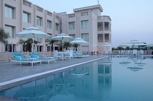 The Lal Vilas Hotels & Resorts in Neemrana, image may contain: Resort, Hotel, Chair, City